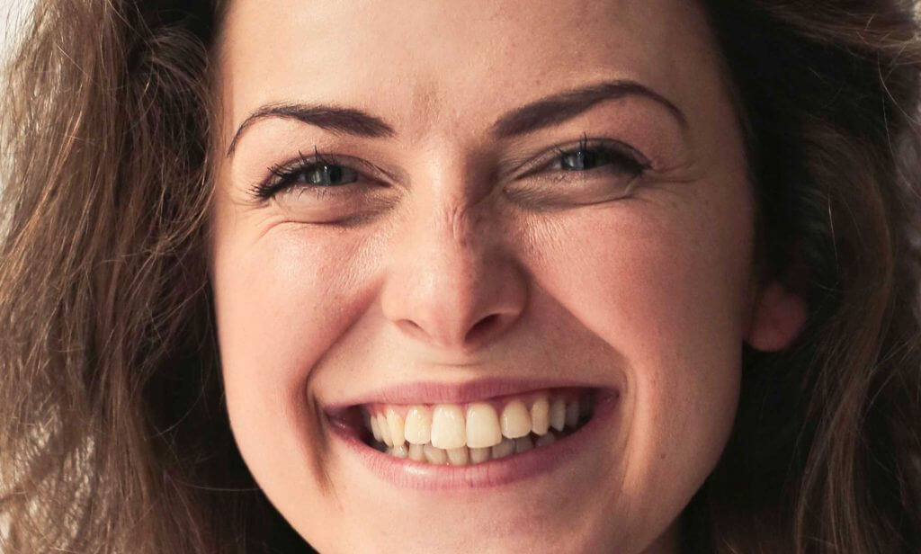 Smile with your strong natural teeth